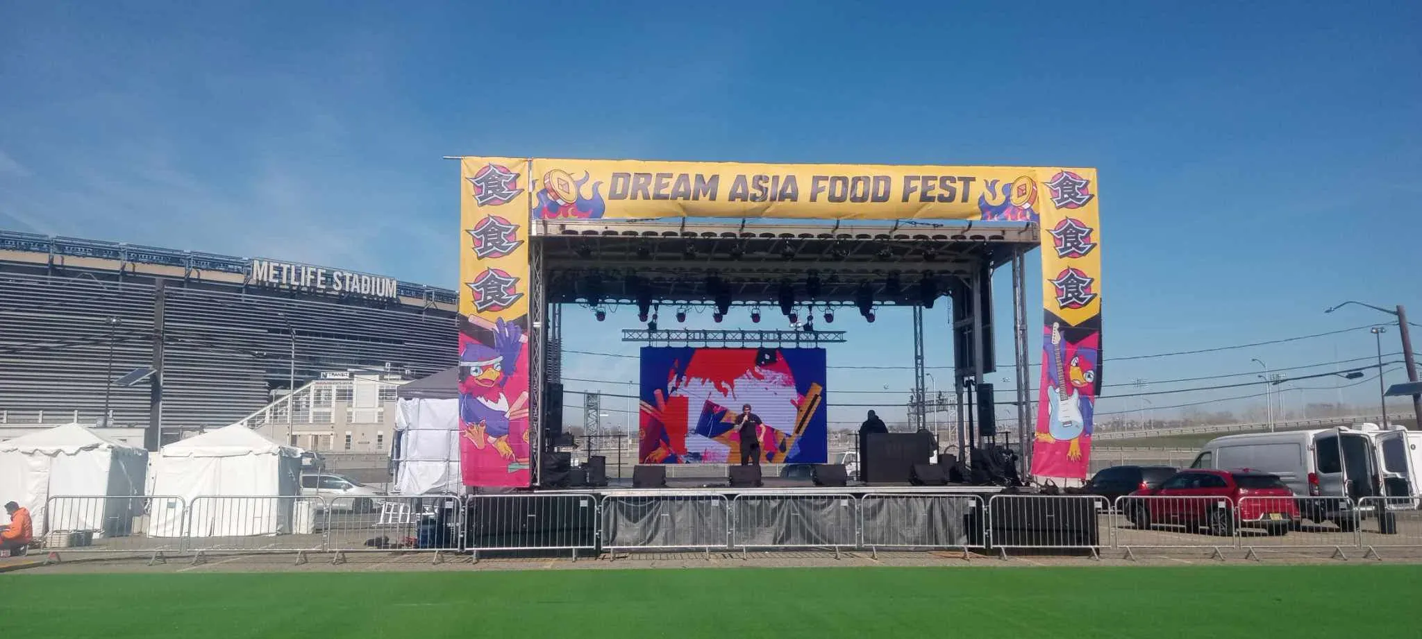 Outdoor stage setup with full production rig at a festival