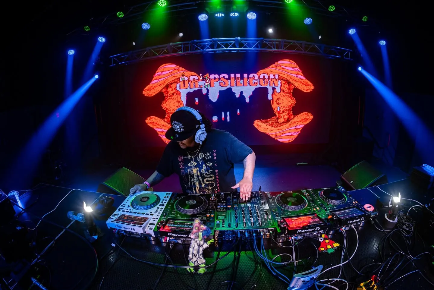 LED wall showing animated visuals at a large-scale event production
